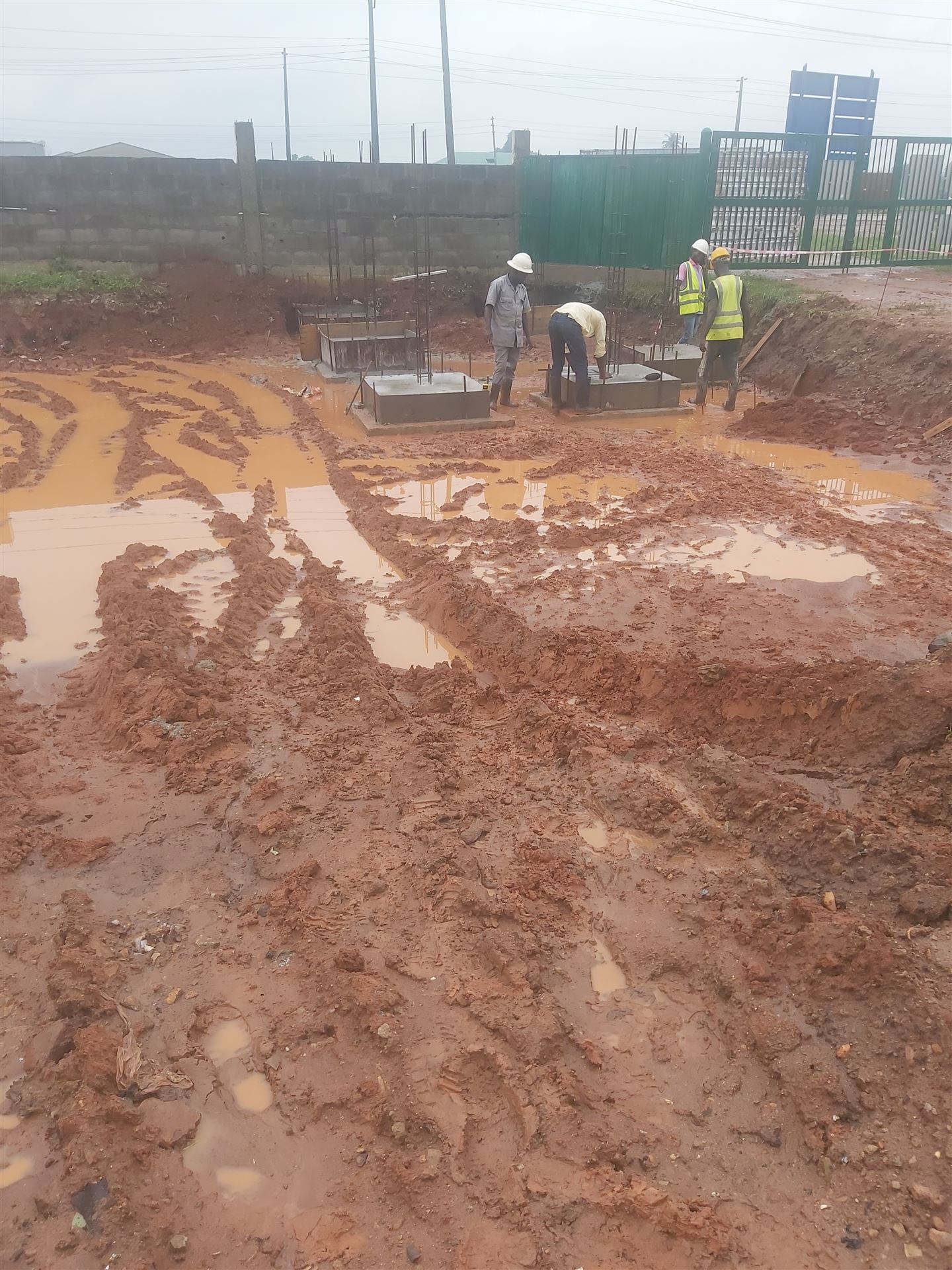 Site team inspecting foundation footings